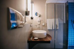 Koupelna v ubytování Hotel Vis à Vis