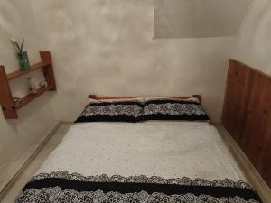 Postel nebo postele na pokoji v ubytování Apartmán Brdy
