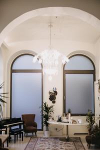 Posezení v ubytování Hotel Vis à Vis