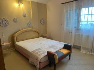 Postel nebo postele na pokoji v ubytování Olive stone Villa