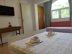 Postel nebo postele na pokoji v ubytování Borovik Guest House