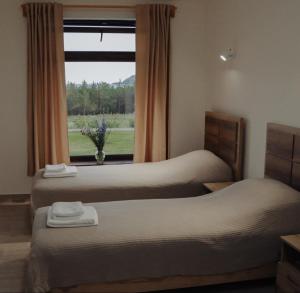 Postel nebo postele na pokoji v ubytování Sevan - Artanish Beach Resort