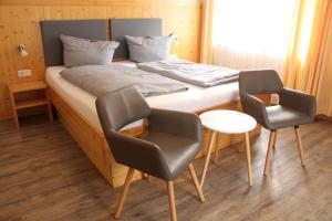Postel nebo postele na pokoji v ubytování REGIOHOTEL Germania am Kurpark Bad Harzburg