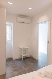 Voodi või voodid majutusasutuse Unique & Spacious 2BR in Valletta Center by ArcoBnb toas