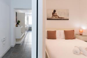 Voodi või voodid majutusasutuse Unique & Spacious 2BR in Valletta Center by ArcoBnb toas