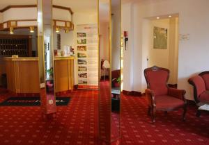 Posezení v ubytování REGIOHOTEL Germania am Kurpark Bad Harzburg