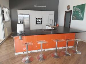 Kuchyň nebo kuchyňský kout v ubytování Maison Solenzara vue mer