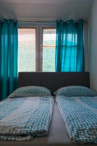 Postel nebo postele na pokoji v ubytování Apartments Božena