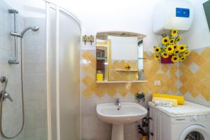 Koupelna v ubytování Villa Rosa - Casa delle Bambole + 12 fotografií