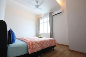 Voodi või voodid majutusasutuse Shamrock Beach Villas 9 Seaview toas