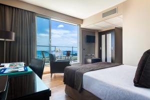 Posteľ alebo postele v izbe v ubytovaní Hotel Best Front Maritim