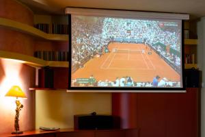 Televisor o centre d'entreteniment de Bohemian Suite spacious and central Loft