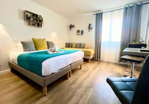 Postel nebo postele na pokoji v ubytování Hotel L'Escapade