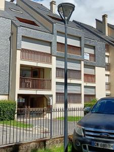 a car parked in front of a building at Aurette in Saint-Lary-Soulan +3 photos