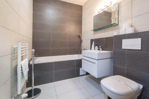 Ένα μπάνιο στο TATRYSTAY Apartment Svišť