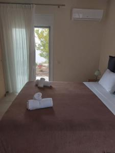 Postel nebo postele na pokoji v ubytování Aegean View Villa