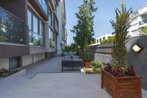 Zahrada ubytování Doqu Suites Hotel