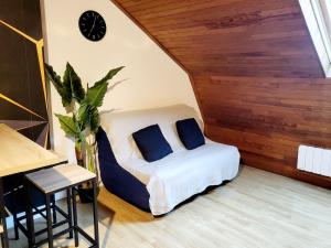 Posezení v ubytování appartement le cocon doré