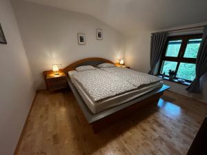 Postel nebo postele na pokoji v ubytování Haus am Wald -FeWo 2