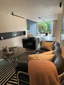 En sittgrupp på Suite & Vins - Gîte d’exception
