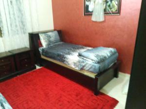 Postel nebo postele na pokoji v ubytování Ayola Apartment