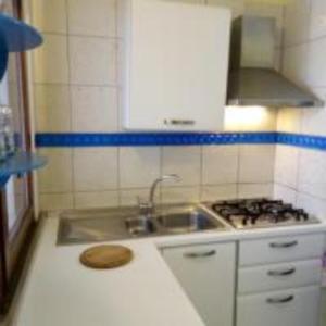 A kitchen or kitchenette at Margherita Holiday House