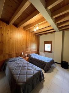 Ένα ή περισσότερα κρεβάτια σε δωμάτιο στο La Vall Apartaments La Plaça