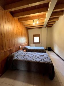 Ένα ή περισσότερα κρεβάτια σε δωμάτιο στο La Vall Apartaments La Plaça
