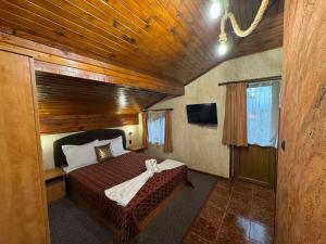 Postel nebo postele na pokoji v ubytování Guest House Ivan