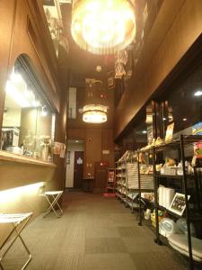 a large room with a store with a largeermottermott at Terminal Hotel Matsuyama in Matsuyama