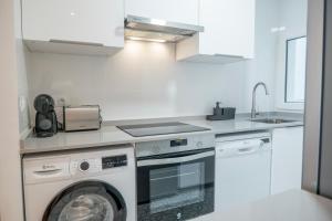 Кухня или мини-кухня в Suite85, Exclusivo Apartamento de diseño en la Playa
