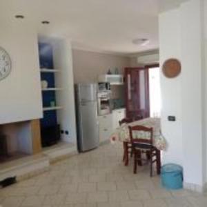 A kitchen or kitchenette at Margherita Holiday House