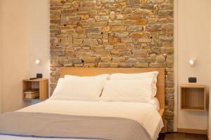 Postel nebo postele na pokoji v ubytování B&B Baia Di Trentova