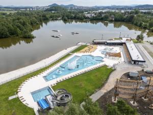 an aerial view of a resort on a river at Apartmán Wake u aquaparku in Česká Lípa