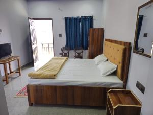 Giường trong phòng chung tại Nature view homestay Birthi Waterfall