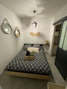 Ένα ή περισσότερα κρεβάτια σε δωμάτιο στο Appartement Jonzac