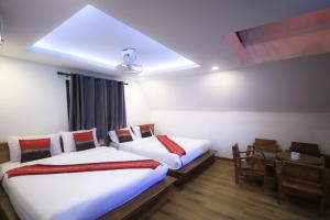 Postel nebo postele na pokoji v ubytování Chenfong Rakthai Resort-ไร่ชาเฉินฟงรีสอร์ท