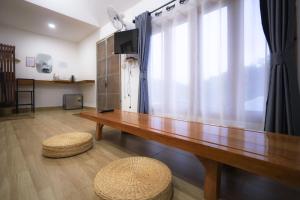 Posezení v ubytování Chenfong Rakthai Resort-ไร่ชาเฉินฟงรีสอร์ท