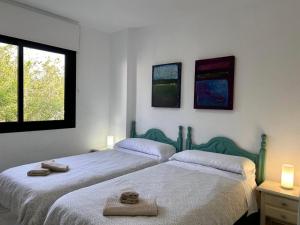Posteľ alebo postele v izbe v ubytovaní Apartamento Casa Mar Playa