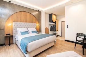 Postel nebo postele na pokoji v ubytování Thalassa Apart Hotel