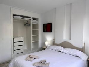 Posteľ alebo postele v izbe v ubytovaní Apartamento Casa Mar Playa