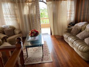 a living room with a couch and a coffee table at Brookville in Georgetown