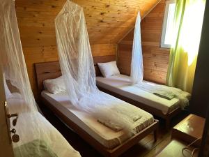 Postelja oz. postelje v sobi nastanitve Velicanka hostel