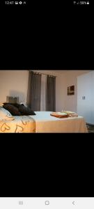 two beds sitting next to each other in a room at Gemma del salento in Sternatia