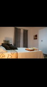 two beds sitting next to each other in a room at Gemma del salento in Sternatia