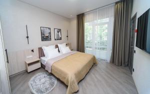 Voodi või voodid majutusasutuse Sovinyon Resort toas