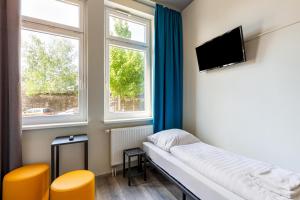 TV a/nebo společenská místnost v ubytování a&o Aachen Hauptbahnhof