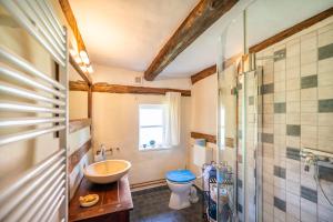 Koupelna v ubytování Hexenhaus auf Rügen + 27 fotografií