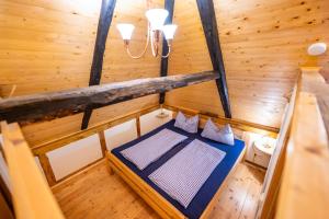 Postel nebo postele na pokoji v ubytování Hexenhaus auf Rügen