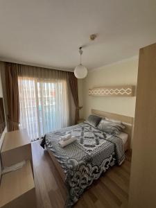 Postel nebo postele na pokoji v ubytování Agartha Suite Hotel Kemer